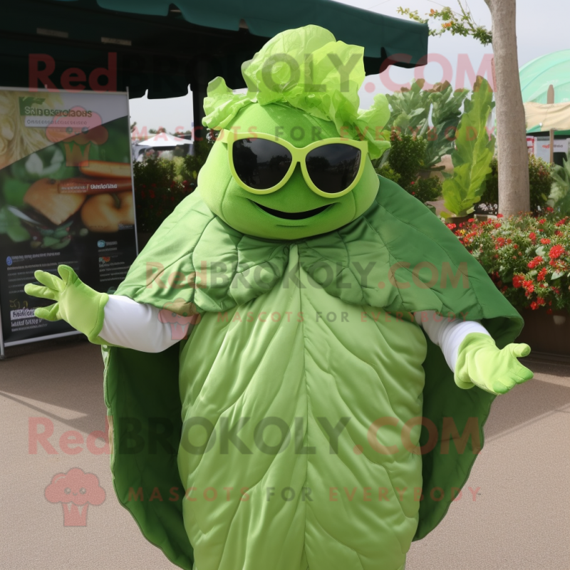 Olive Cabbage Leaf mascot costume character dressed with a Cover-up and Sunglasses Olive Cabbage Leaf mascot costume character dressed with a Cover-up and Sunglasses