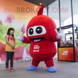 Red Mango mascot costume character dressed with a Romper and Watches