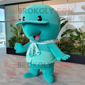 Teal Whale mascot costume character dressed with a Bikini and Hat pins