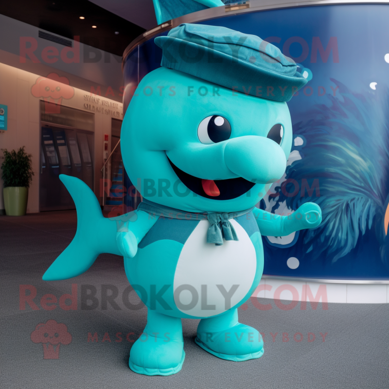Teal Whale mascot costume character dressed with a Bikini and Hat pins Teal Whale mascot costume character dressed with a Bikini and Hat pins
