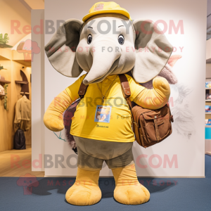 Gold Elephant mascot costume character dressed with a Cargo Shorts and Clutch bags