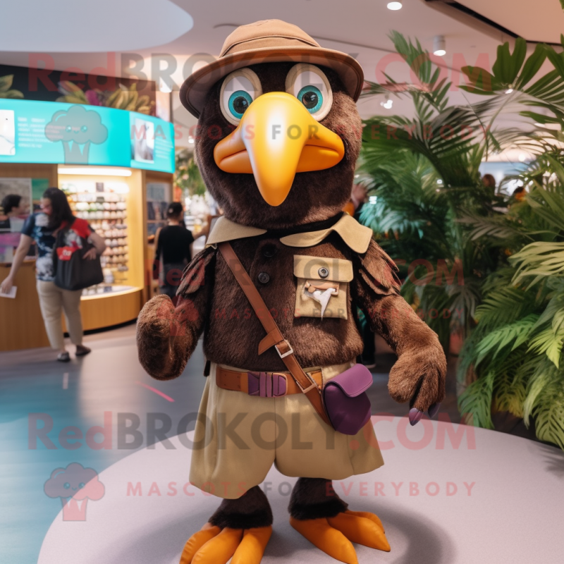 Brown Toucan mascot costume character dressed with a Playsuit and Caps