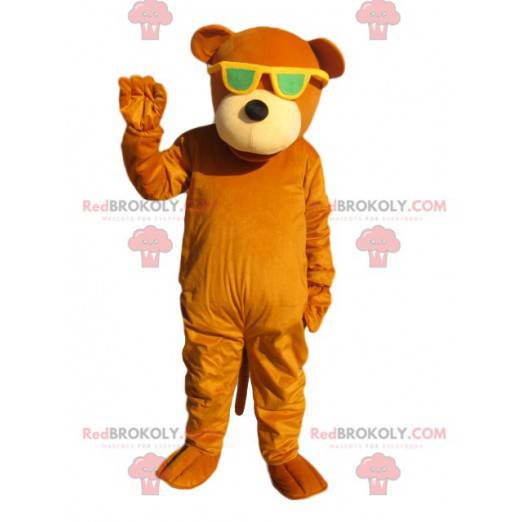 Mascotte d'ours orange avec des lunettes de soleil jaunes -