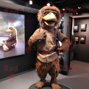 Brown Dodo Bird mascot costume character dressed with a Jumpsuit and Belts