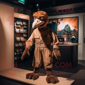 Brown Dodo Bird mascot costume character dressed with a Jumpsuit and Belts