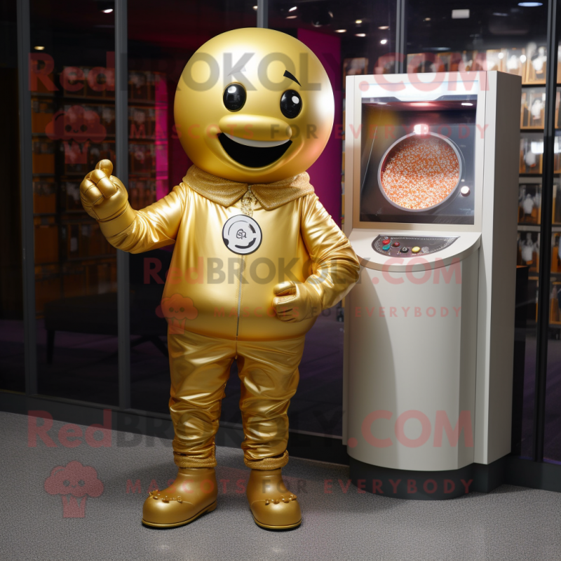 Gold Gumball Machine mascot costume character dressed with a T-Shirt and Shoe laces Gold Gumball Machine mascot costume character dressed with a T-Shirt and Shoe laces