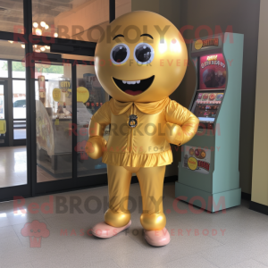 Gold Gumball Machine mascot costume character dressed with a T-Shirt and Shoe laces