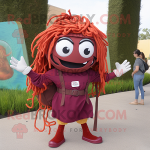 Maroon Pesto Pasta mascot costume character dressed with a Blouse and Backpacks