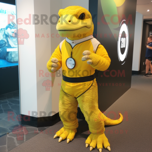 Lemon Yellow Komodo Dragon mascot costume character dressed with a Rash Guard and Smartwatches