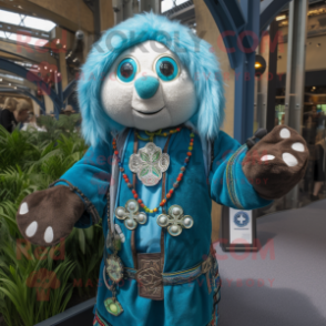 Turquoise Celtic Cross mascot costume character dressed with a Cardigan and Suspenders