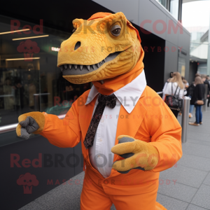 Orange Iguanodon mascot costume character dressed with a Blouse and Tie pins