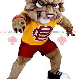 Mascote cachorro leão marrom em roupas esportivas -