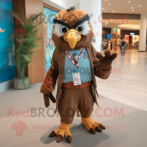 Brown Hawk mascot costume character dressed with a Bermuda Shorts and Earrings