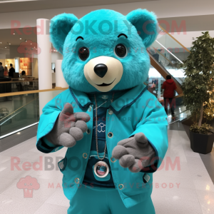 Turquoise Bear mascot costume character dressed with a Jacket and Rings