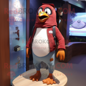 Maroon Penguin mascot costume character dressed with a Denim Shorts and Digital watches