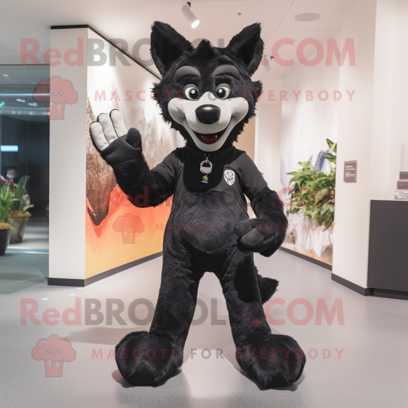 Black Dingo mascot costume character dressed with a Trousers and Foot pads Black Dingo mascot costume character dressed with a Trousers and Foot pads