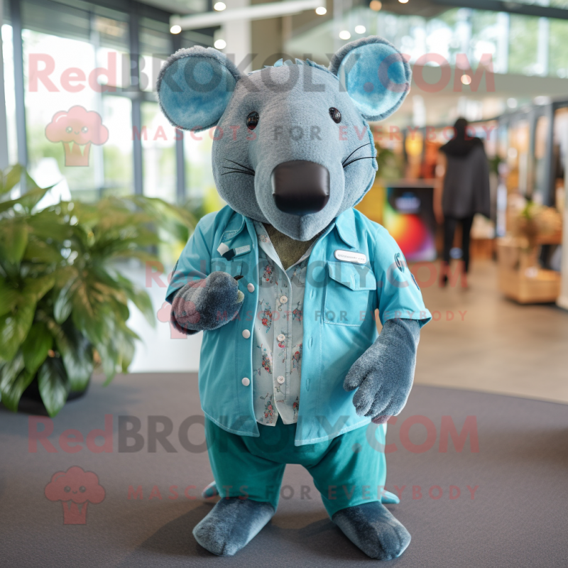 Teal Tapir mascot costume character dressed with a Chambray Shirt and Foot pads