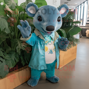 Teal Tapir mascot costume character dressed with a Chambray Shirt and Foot pads