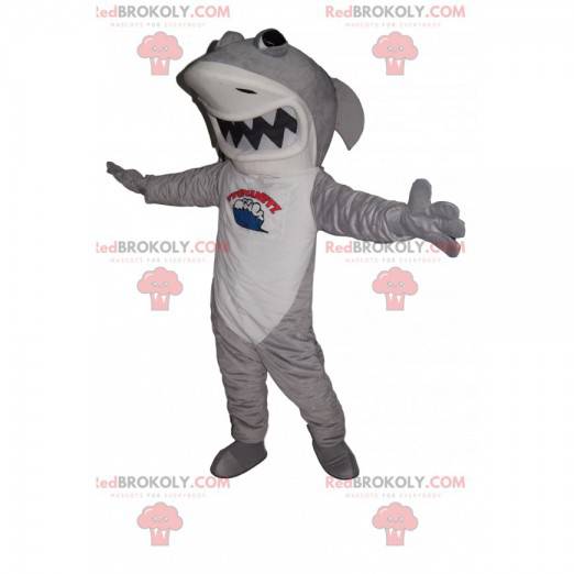 Mascotte de requin gris et blanc avec une grande machoire -