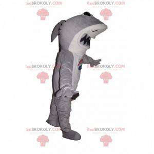 Mascotte de requin gris et blanc avec une grande machoire -