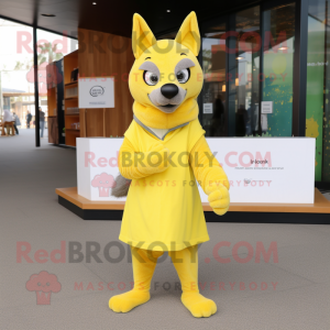 Lemon Yellow Dingo mascot costume character dressed with a Pleated Skirt and Mittens