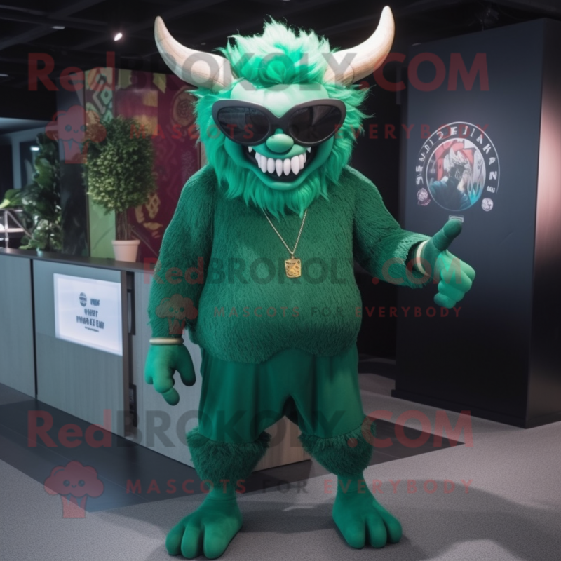 Forest Green Devil mascot costume character dressed with a Blouse and Sunglasses Forest Green Devil mascot costume character dressed with a Blouse and Sunglasses