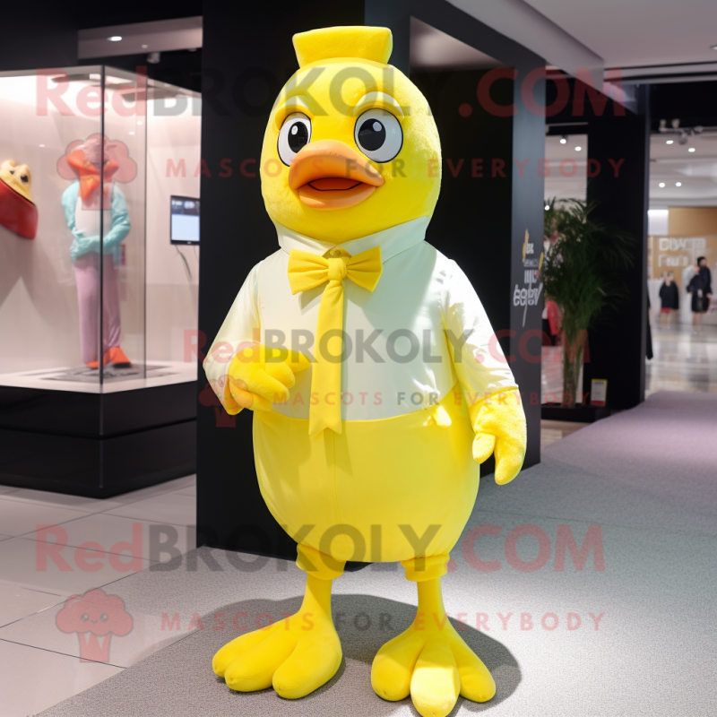 Lemon Yellow Hens mascot costume character dressed with a Polo Tee and Ties Lemon Yellow Hens mascot costume character dressed with a Polo Tee and Ties