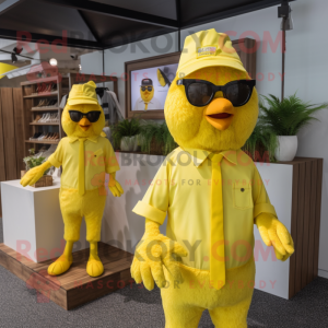 Lemon Yellow Hens mascot costume character dressed with a Polo Tee and Ties