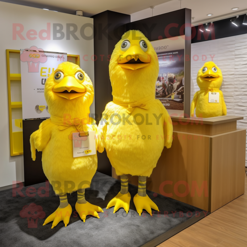 Lemon Yellow Hens mascot costume character dressed with a Polo Tee and Ties Lemon Yellow Hens mascot costume character dressed with a Polo Tee and Ties