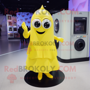 Lemon Yellow Camera mascot costume character dressed with a A-Line Skirt and Foot pads