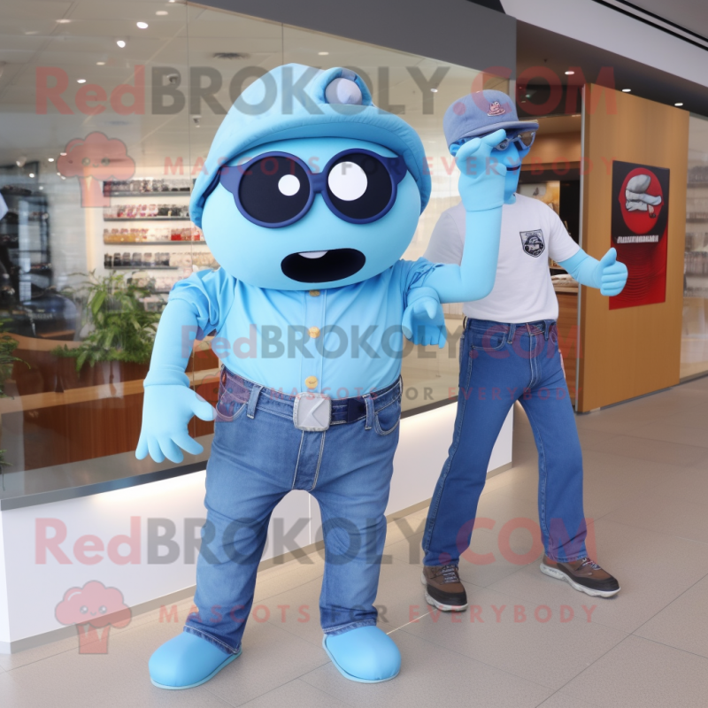 Sky Blue Cyclops mascot costume character dressed with a Mom Jeans and Belts Sky Blue Cyclops mascot costume character dressed with a Mom Jeans and Belts