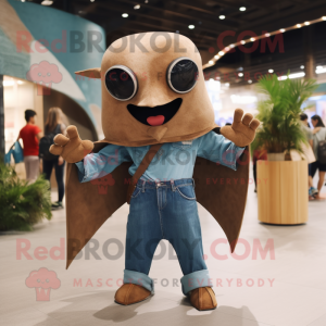 Brown Manta Ray mascot costume character dressed with a Denim Shorts and Mittens