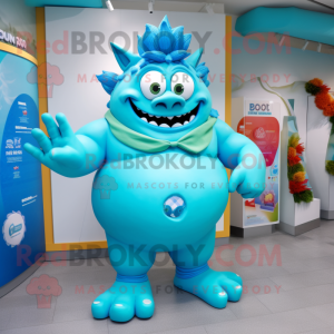 Cyan Ogre mascot costume character dressed with a Swimwear and Brooches