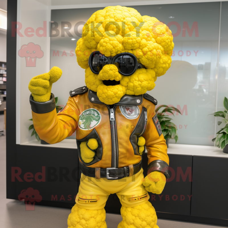 Yellow Cauliflower mascot costume character dressed with a Moto Jacket and Belts