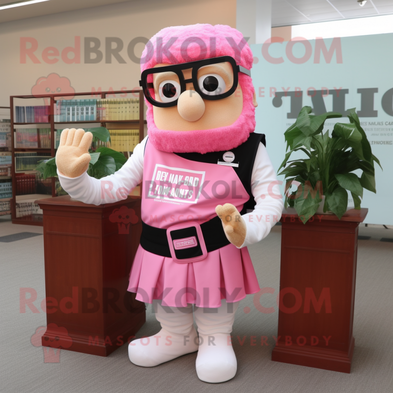 Pink Caesar Salad mascot costume character dressed with a Vest and Reading glasses