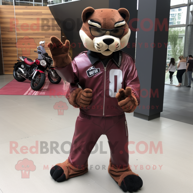 Maroon Puma mascot costume character dressed with a Moto Jacket and Shoe clips Maroon Puma mascot costume character dressed with a Moto Jacket and Shoe clips
