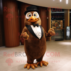 Brown Penguin mascot costume character dressed with a Suit Jacket and Earrings
