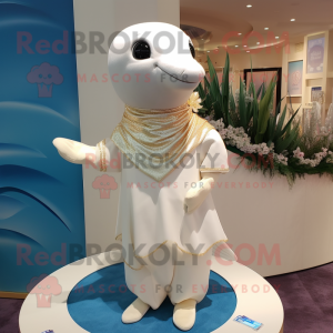 Cream Dolphin mascot costume character dressed with a Mini Dress and Shawl pins
