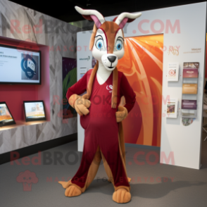 Maroon Gazelle mascot costume character dressed with a Graphic Tee and Wraps