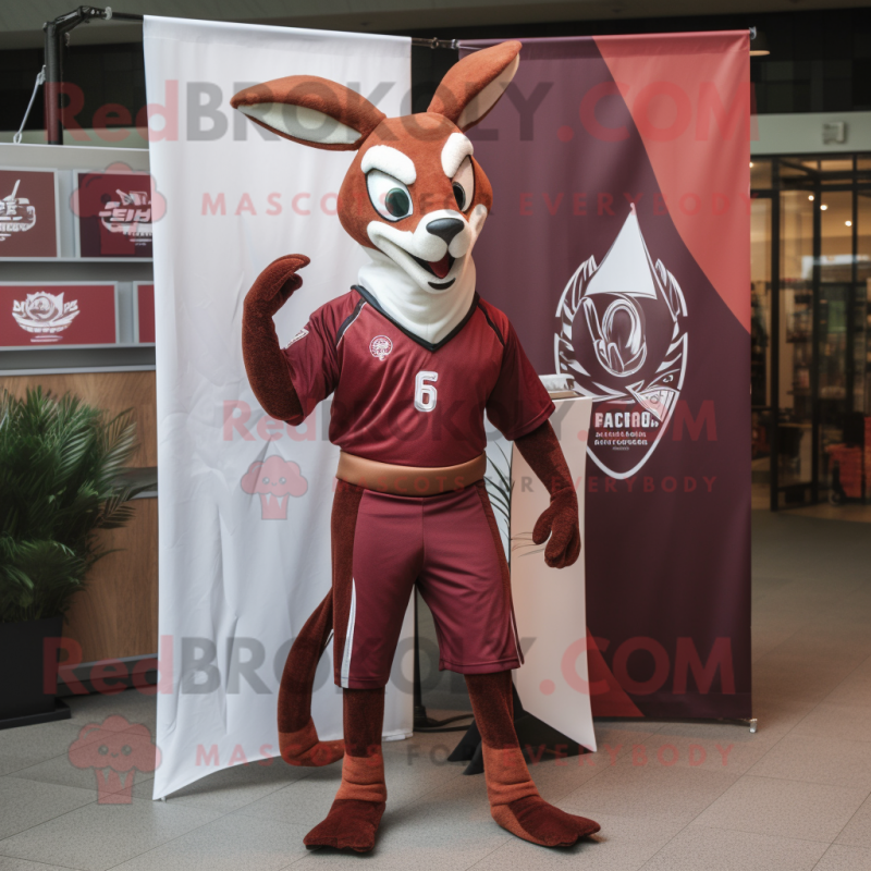Maroon Gazelle mascot costume character dressed with a Graphic Tee and Wraps Maroon Gazelle mascot costume character dressed with a Graphic Tee and Wraps