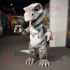 Silver Tyrannosaurus mascot costume character dressed with a Overalls and Clutch bags