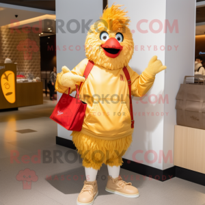 Gold Chicken Parmesan mascot costume character dressed with a Sweatshirt and Handbags