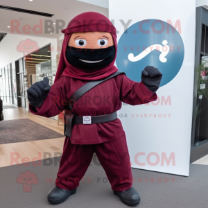 Maroon Ninja mascot costume character dressed with a Cover-up and Berets