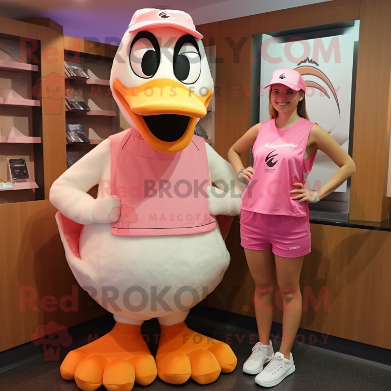 Pink Goose mascot costume character dressed with a Tank Top and Caps Pink Goose mascot costume character dressed with a Tank Top and Caps