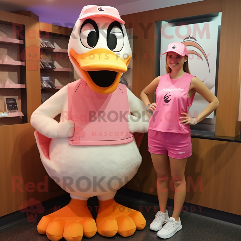 Pink Goose mascot costume character dressed with a Tank Top and Caps