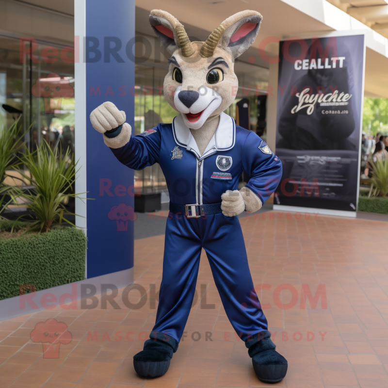 Navy Gazelle mascot costume character dressed with a Moto Jacket and Belts Navy Gazelle mascot costume character dressed with a Moto Jacket and Belts