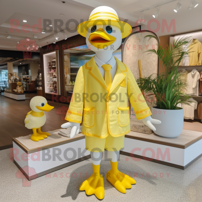 Lemon Yellow Geese mascot costume character dressed with a Swimwear and Hat pins Lemon Yellow Geese mascot costume character dressed with a Swimwear and Hat pins