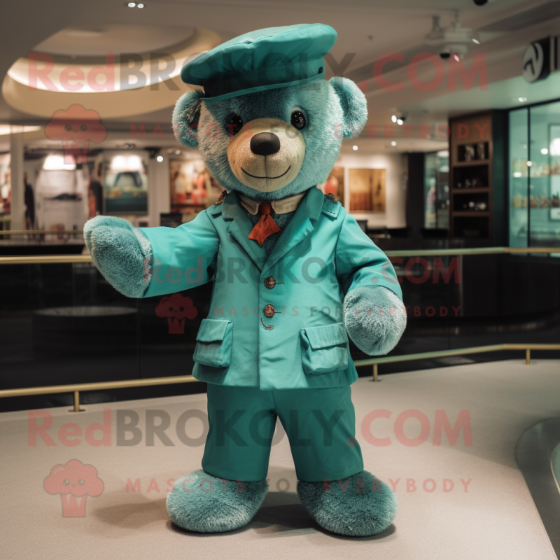 Teal Teddy Bear mascot costume character dressed with a Playsuit and Hat pins Teal Teddy Bear mascot costume character dressed with a Playsuit and Hat pins