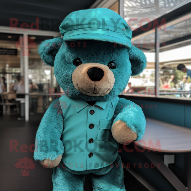 Teal Teddy Bear mascot costume character dressed with a Playsuit and Hat pins Teal Teddy Bear mascot costume character dressed with a Playsuit and Hat pins