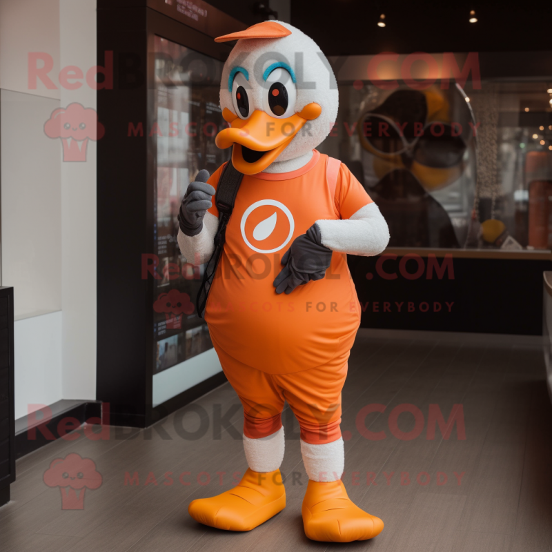 Orange Swan mascot costume character dressed with a Jeggings and Smartwatches